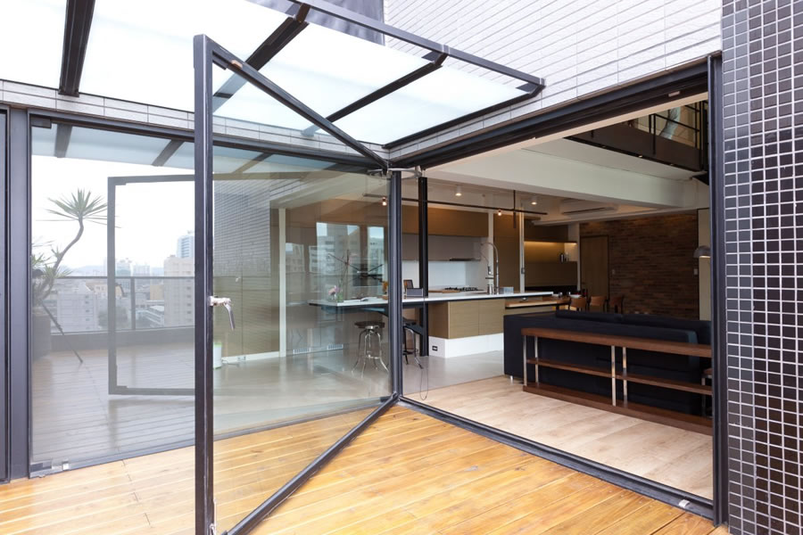 a large door opening to a terrace